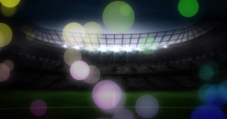 Poster - Animation of failing spots and glowing lights over football stadium