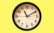 © amonphan - Classic black and white analog clock red background at Eleven o'clock ten minutes