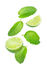 Wall Mural - Peppermint leaves (Mint leaf) and fresh lime slice flying in the air isolated on white background.