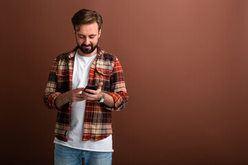 Wall Mural - handsome man on brown background