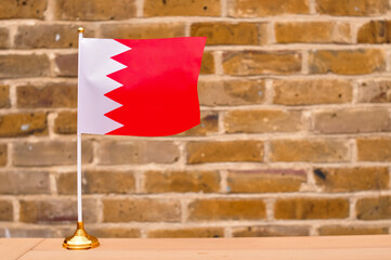 Wall Mural - close up of national flag of bahrain red and white colors