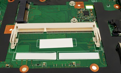 Poster - electrical circuit from a laptop, with a connector for RAM, close-up