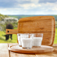 Wall Mural - Fresh cold milk on table and free space for your decoration. 