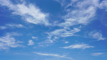 wispy clouds and blue sky suitable for background use or sky substitution