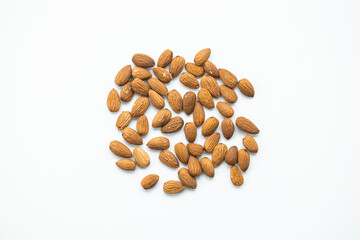 Wall Mural - Almonds isolated on white.