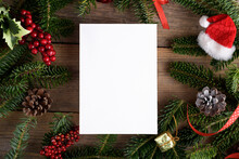 Christmas 5x7 Card Mockup Template With Fir Twigs And Christmas Decoration On Wooden Background. Design Element For Christmas And New Year Congratulation, Greeting Or Invitation Card