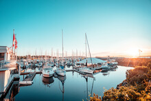 Boats In The Harbor / Port At Golden Hour / Sunset / Sunrise Located In Sidney, Vancouver Island, British Columbia, Canada Near Victoria, Swartz Bay, Tofino