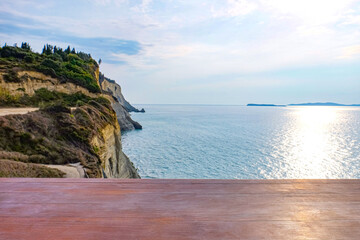 View of empty wooden table at sea resort