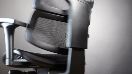 Wall Mural - texture weave faux fabric seat and back of comfortable ergonomic office chair