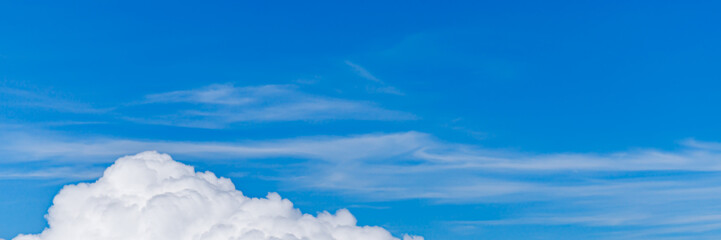 Canvas Print - Clouds from above. View from airplane.  blue sky view from plane. sky wallpaper with space for your text . Aerial view of the blue sky. High in the Heavens.   View from Airplane Window