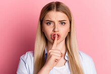 Photo Of Young Pretty Lady Cover Lips Finger Shh Keep Secret Shut Up Isolated Over Pink Color Background