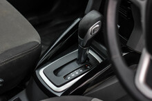 Automatic Transmission Shift Selector In The Car Interior. Closeup A Manual Shift Of Modern Car Gear Shifter. 4x4 Gear Shift
