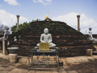 Ruins of Girihandu Seya pagoda building. Translation: 1st paragraph : Buddhist sermon to worship the temple. Second paragraph 