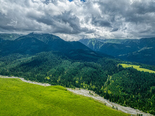 Sticker - landscape with clouds, mountains and cypress forest