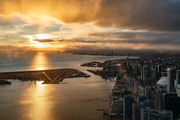 Wall Mural - Aerial city view of the Billy Bishop airport with of TorontoToronto skyline in the background