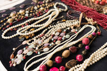 Antiques At Flea Market Or Garage Sale - Vintage Jewelry, Retro Pearl Necklace And Other Vintage Things. Collectibles Memorabilia Concept. Selective Focus