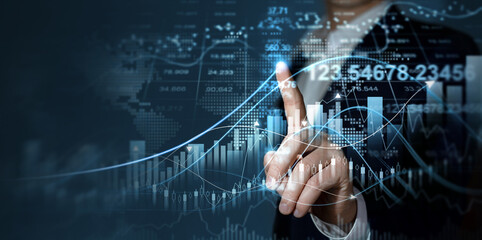 Businessman touches digital screen with growth graph analysing stock market profit. Strategy for growth and success business. Concept of business growth, profit, development and success.	