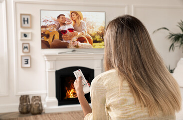 Sticker - Woman watching romantic movie on TV at home