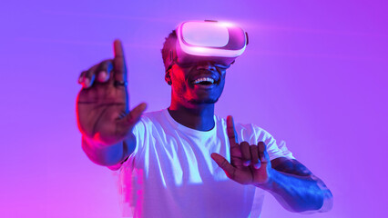 Poster - Cool guy in VR glasses exploring cyberspace, touching imaginary screen