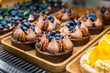 Homemade tartlets, blueberry cakes. dessert with a blueberry, chocolate and nuts. selective focus