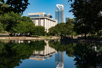 Wall Mural - The Charlotte, NC skyline viewed from Marshall Park on a blue sky day in the summer