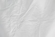 abstract wrinkled white surface sheet material background backdrop