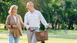 © Rapeepat - Senior Caucasian couple hugging in park. Family with a happy smile feels relaxed with nature in the morning. Or in the evening. Enter elderly society And retire from work. Concept health insurance