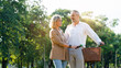 © Rapeepat - Senior Caucasian couple hugging in park. Family with a happy smile feels relaxed with nature in the morning. Or in the evening. Enter elderly society And retire from work. Concept health insurance