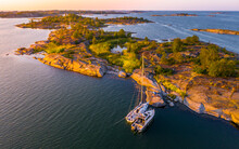 Boats Moored At Island In Stockholm Archipelago Sweden