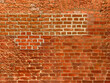 Red brick wall textured background.