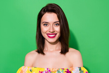 Wall Mural - Portrait of pretty cheerful young lady toothy beaming smile look camera isolated on green color background