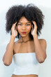 © kanpisut - Portrait of African American woman with bushy curly hairstyle