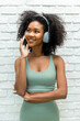 © kanpisut - Portrait of African American woman with bushy curly hairstyle