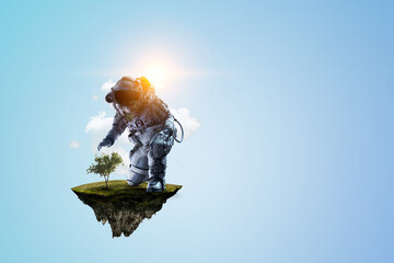 Wall Mural - spaceman on a light bulb
