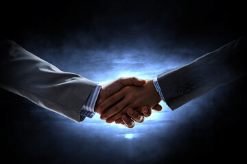 Wall Mural - Partnership concept. Image of handshake