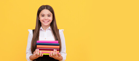 Wall Mural - happy teen girl in school uniform hold book stack, reading. Banner of school girl student. Schoolgirl pupil portrait with copy space.