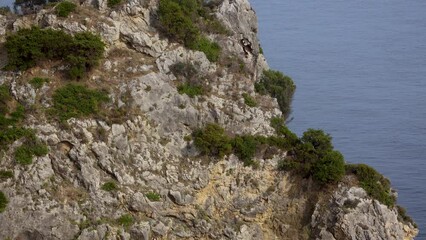 Canvas Print - Rocks on a mountain in Palaiokastritsa village, Corfu Island in Greece, 4k