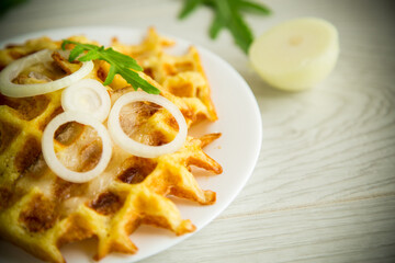 Wall Mural - fried potato cheese vegetable waffles with bacon and onions