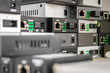 © Климов Максим - Many media converters are stacked on top of each other. Technological background. selective focus