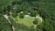 Bird's eye view of Lystra Estate in Chapel Hill, NC surrounded by green forests