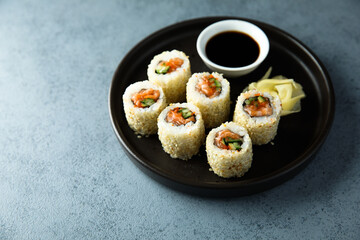 Wall Mural - Traditional salmon sushi rolls