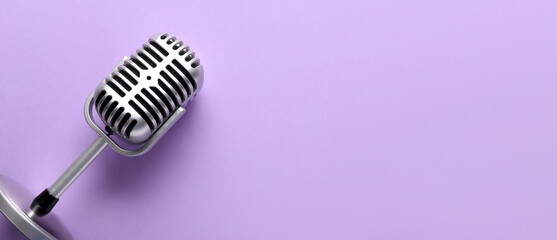 Wall Mural - Retro microphone on lilac background with space for text