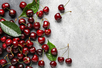 Wall Mural - Tasty ripe cherries on light background