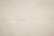 © Manitchaya - Fabric canvas woven texture background in pattern in light beige cream brown color blank. Natural gauze linen, carpet wool and cotton cloth textile as sack.