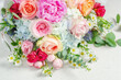 Bunch of flowers on white marble table, festive and wedding flower bouquet