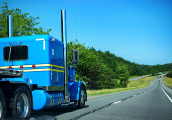 This Blue truck on the highway just happens to be the same color as the Sky Today.  Sky Blue truck on Route 17 in Windsor in Upstate NY.