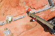 Construction workers pouring concrete columns at a building site an aerial view