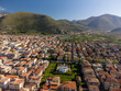 Aerial view on houses and streets of Fondi, town in agricultural valley between Terracina and Sperlonga, Italy