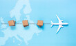 © hakinmhan - Logistics or cargo service with airplane and product box order on world map