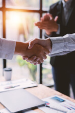 Business Handshake For Teamwork Of Business Merger And Acquisition,successful Negotiate,hand Shake, Businessman Shake Hand With Partner To Celebration Partnership And Business Deal Concept